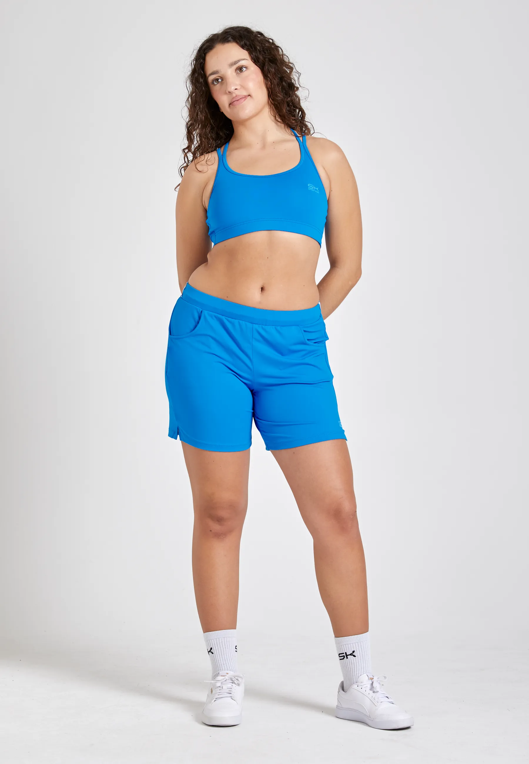 Tennis Bermuda shorts, cyan blue